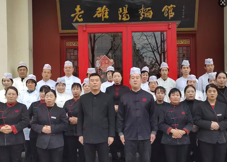 坚守九春秋 面香庆华章